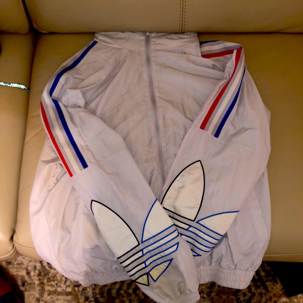 The brand is adidas size medium color white never been worn